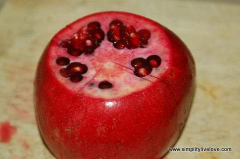 score the pomegranate