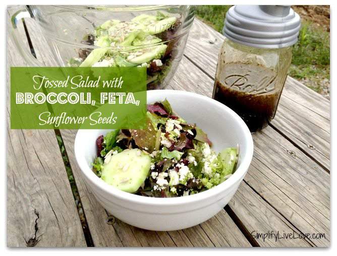 tossed salad with broccoli, feta, and sunflower seeds