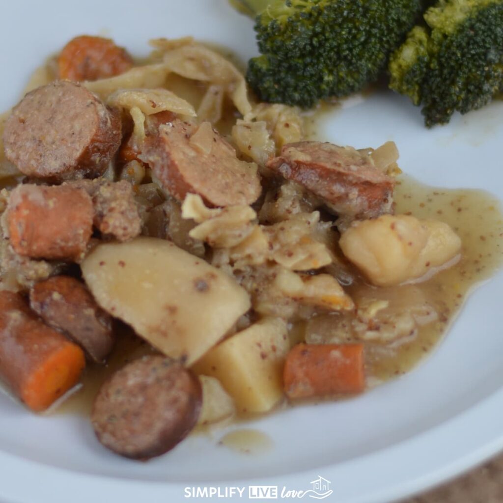 slow cooker sausage and cabbage on a plate