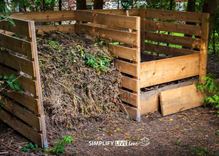 backyard composting piles made from wooden pallets