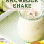 shamrock shake recipe copycat with kiwis bananas and oranges in a glass jar on a green gingham table