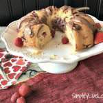 Red Berry Yogurt Bundt Cake with Chocolate Cream Cheese Frosting perfect for Valentine's Day