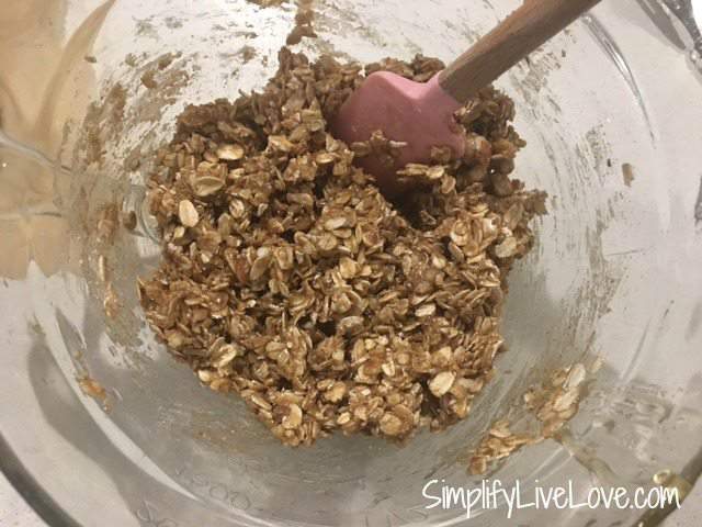 fold the dry and wet granola ingredients together