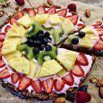 slice and serve the homemade granola fruit pizza