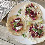 serve salmon street tacos with lime wedges, chopped jalapeno, and cilantro