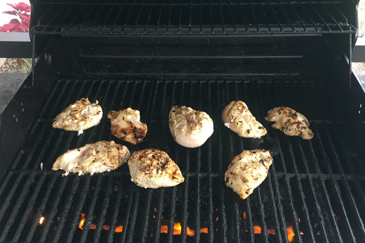 chicken breasts on a grill