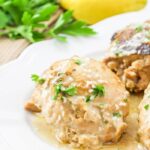 plated Tahini Chicken Thighs with lemon