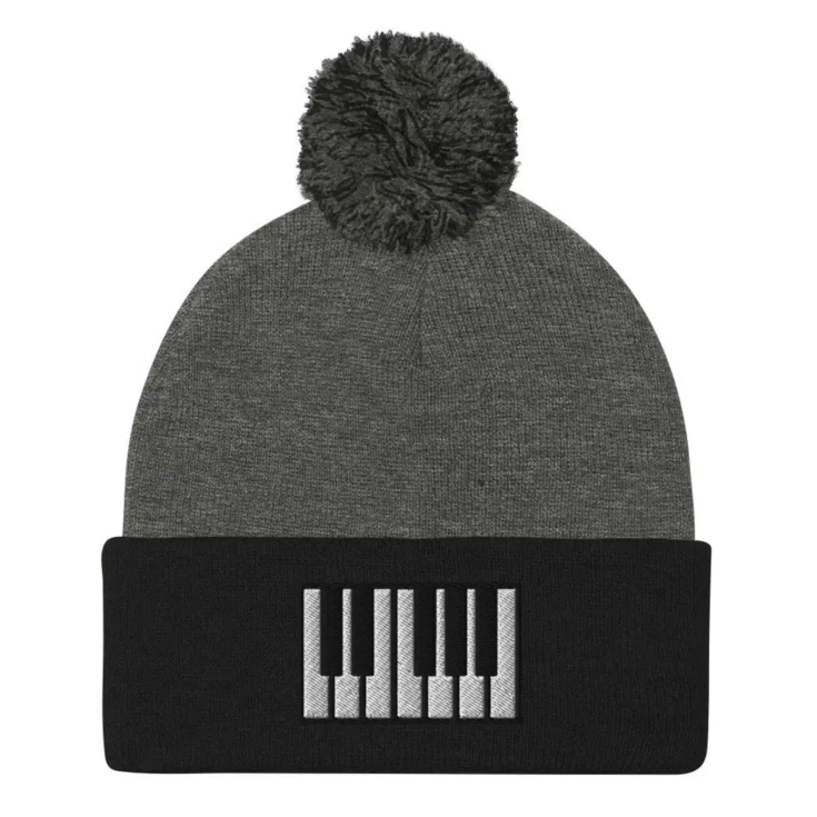 Embroidered keyboard on beanie with pompom