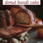 apple cider donut bundt cake pin - slice of bundt cake on a wooden stand