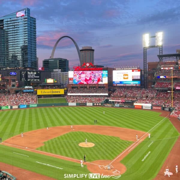 things to do in st louis mo include going to see a cardinals game - iconic view of the arch and busch stadium