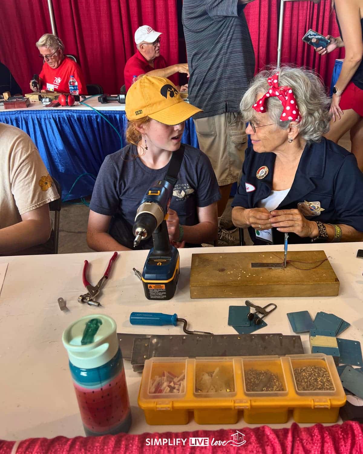 making a rivet name tag at eaa Airventure