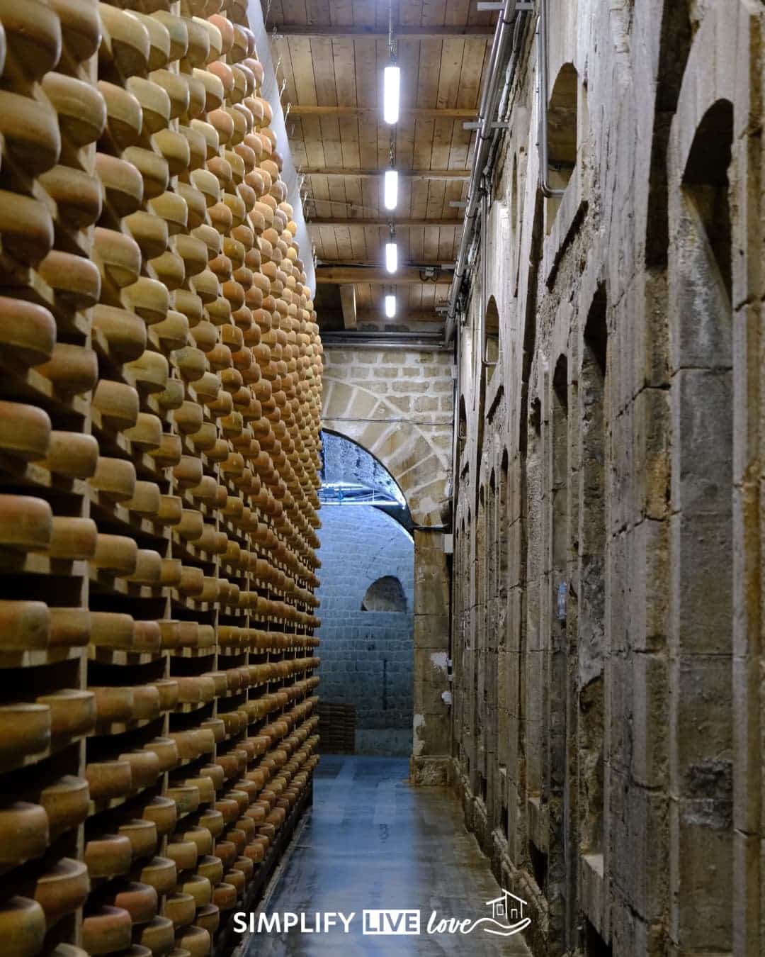 Rows and rows of Comte cheese in Fort Saint-Antoine.